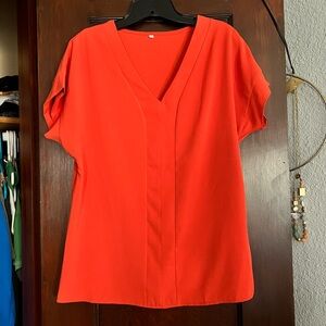 Orange Blouse. Size Small but fits more like a medium.
